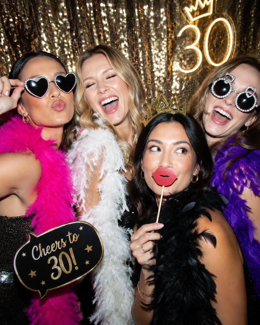 Friends with props at a birthday party